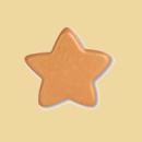 Goldener Stern aus weisser Schokolade