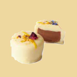 Edelbitter Orange Praline weiss per 100g