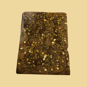 Hausgemachte Vollmilch & ZB Bruchschokolade marmoriert mit kandierten K&uuml;rbiskernen per 100g