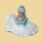 Taufe Baby Figur im Sessel blau